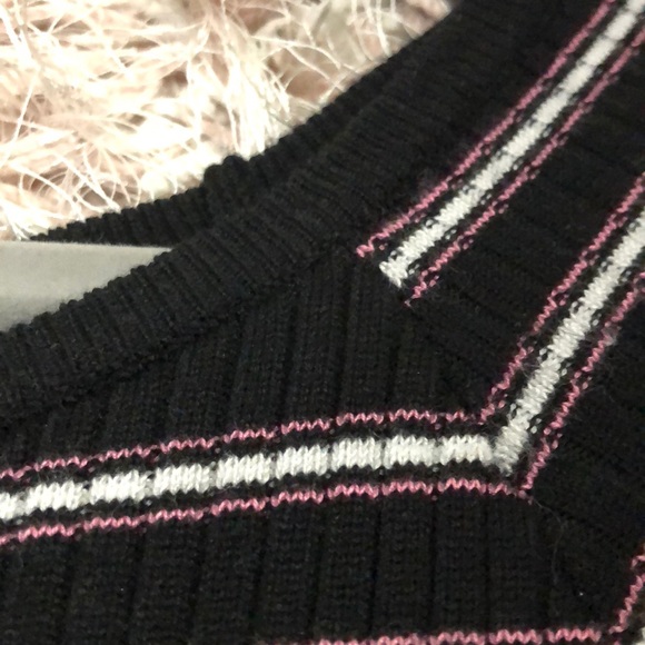 Black shirt with pink and white stripes. - Picture 3 of 3